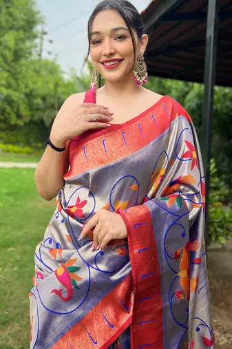 Traditional violet silk blend saree with vibrant floral motifs