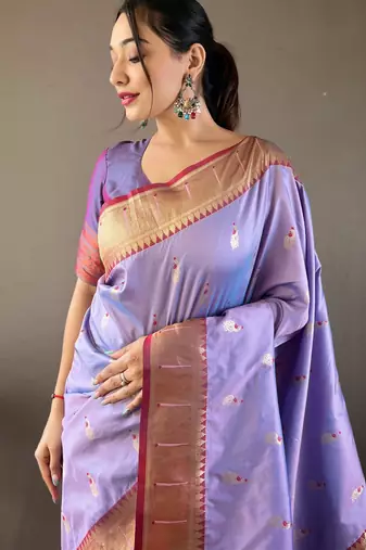 Lavender color silk blend saree with rich contrast weaving pallu & border and beautiful buttis