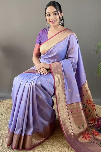 Lavender color silk blend saree with rich contrast weaving pallu & border and beautiful buttis