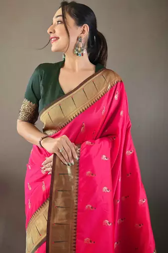 pink color silk blend saree with rich contrast weaving pallu & border and beautiful buttis