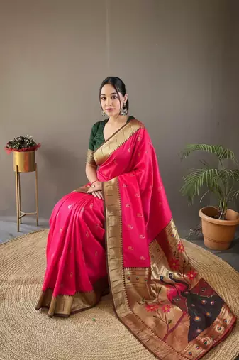 pink color silk blend saree with rich contrast weaving pallu & border and beautiful buttis