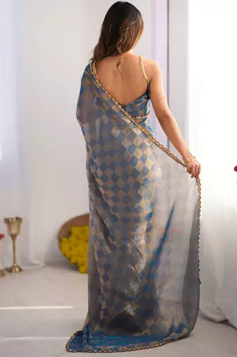 Sky blue color nc chiffon chex fabric beautiful designer woven saree with cut dana lace border
