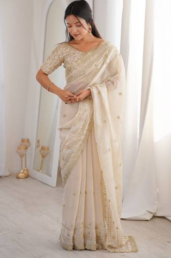 Cream color beautiful sequins work heavy partywear saree