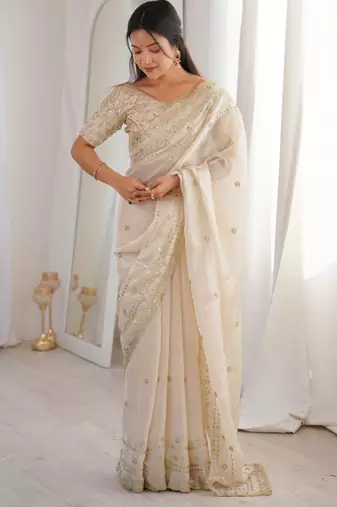 Cream color beautiful sequins work heavy partywear saree