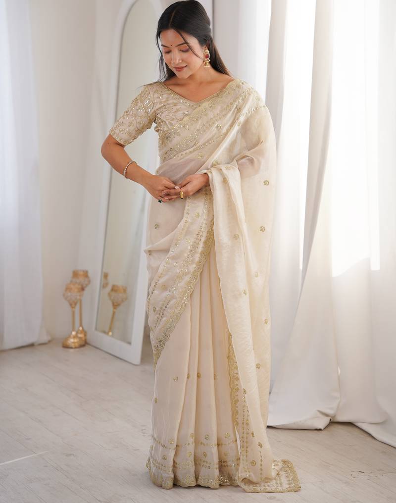 Cream color beautiful sequins work heavy partywear saree