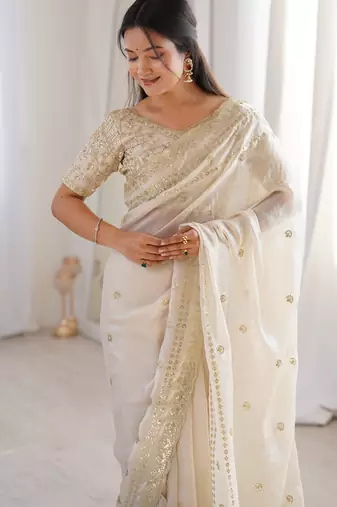 Cream color beautiful sequins work heavy partywear saree