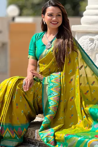 Lemon yellow silk blend ikkat and patola weaving concept saree & contrast blouse