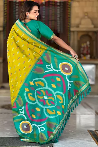 Lemon yellow silk blend ikkat and patola weaving concept saree & contrast blouse