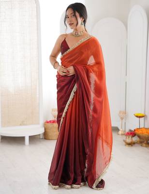 Orange color beautiful fendy satin fabric girlie looks stylish saree 1