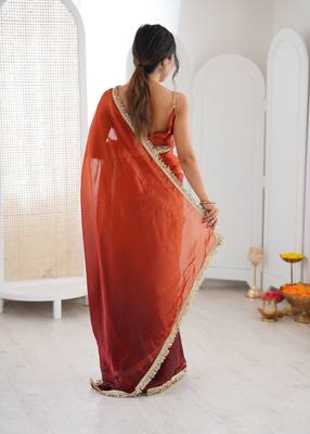 Orange color beautiful fendy satin fabric girlie looks stylish saree 2