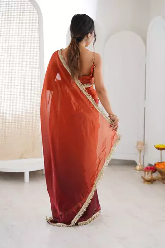Orange color beautiful fendy satin fabric girlie looks stylish saree