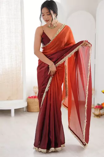 Orange color beautiful fendy satin fabric girlie looks stylish saree