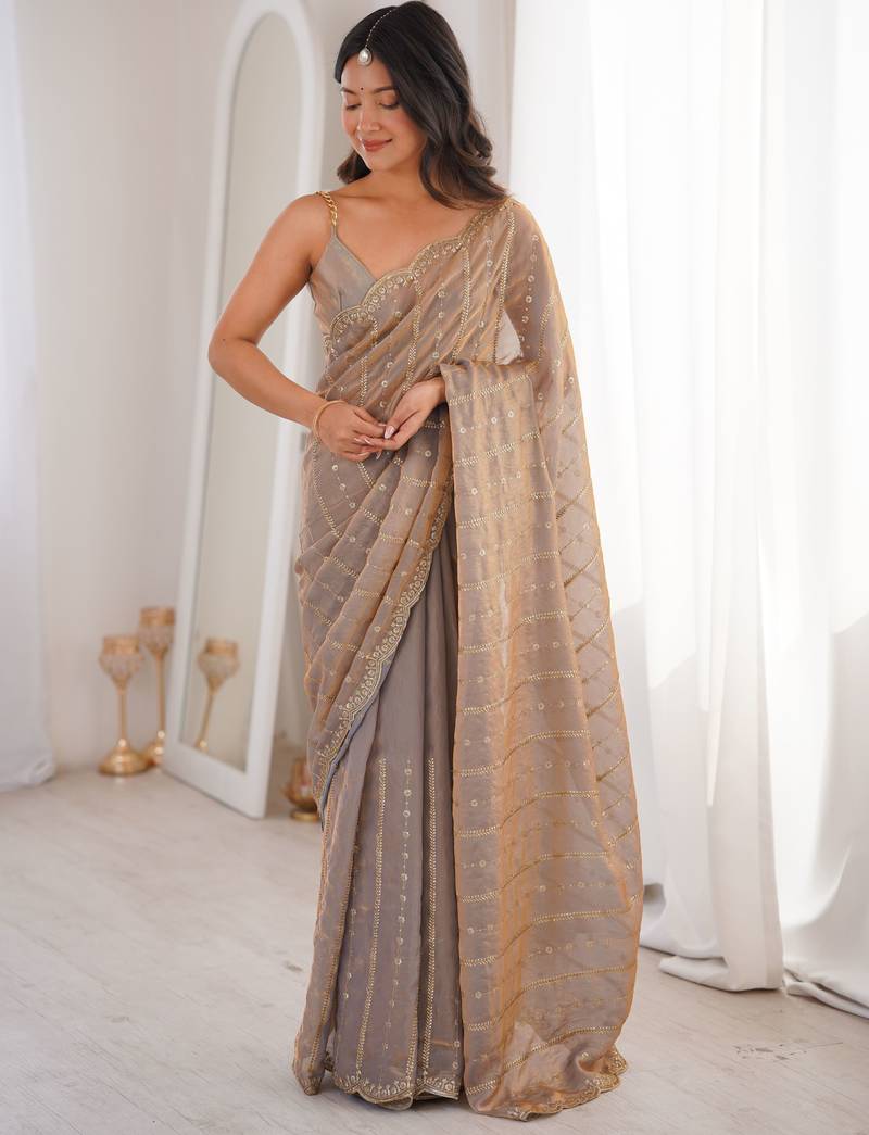 Chiku color stylish bollywood looks fendy satin fabric saree