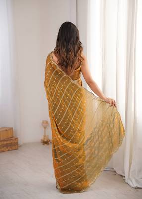 Gold color stylish bollywood looks fendy satin fabric saree 2