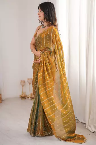 Gold color stylish bollywood looks fendy satin fabric saree
