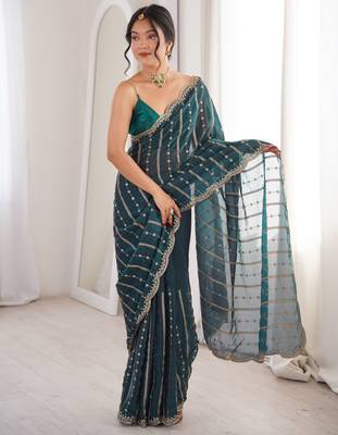 Teal color stylish bollywood looks fendy satin fabric saree 1