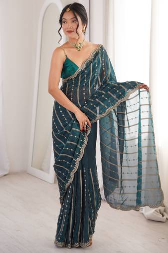 Teal color stylish bollywood looks fendy satin fabric saree
