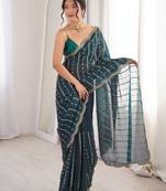 Teal color stylish bollywood looks fendy satin fabric saree