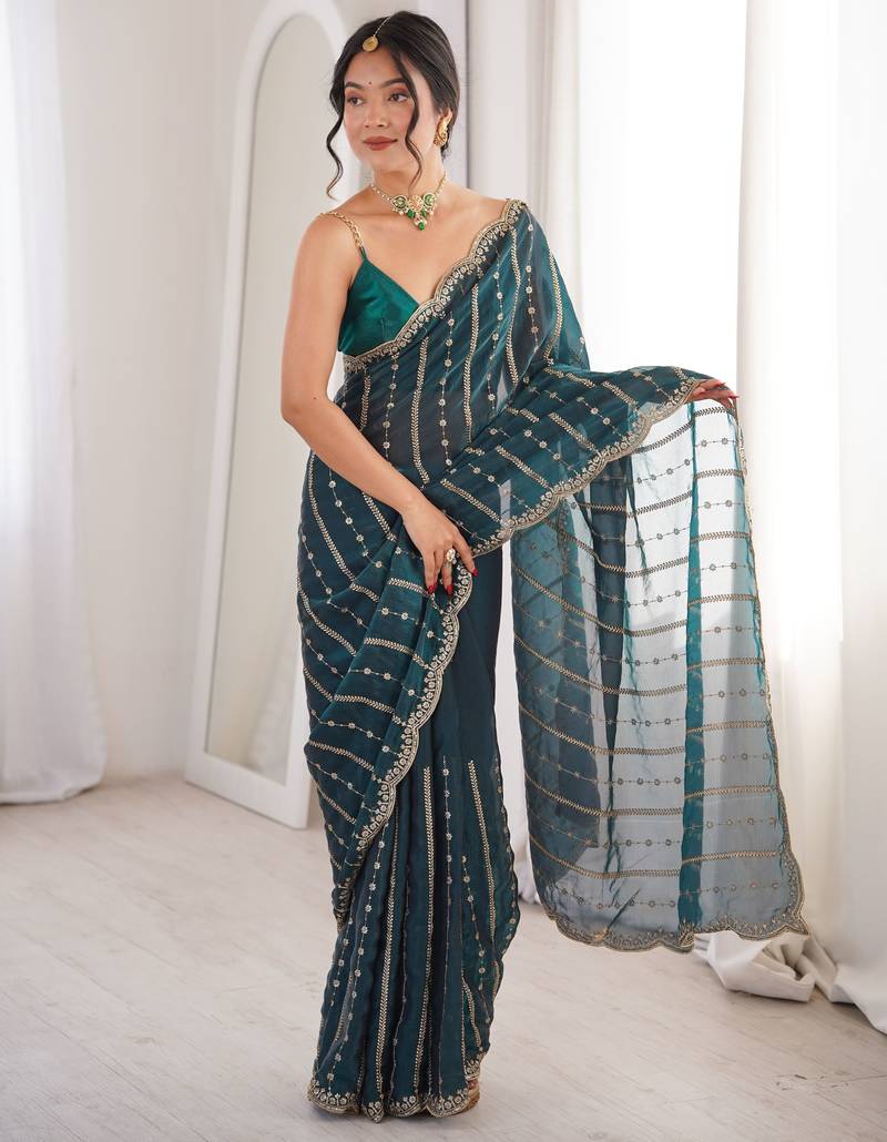 Teal color stylish bollywood looks fendy satin fabric saree