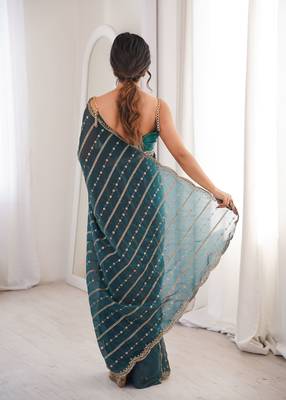 Teal color stylish bollywood looks fendy satin fabric saree 2