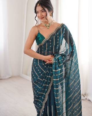 Teal color stylish bollywood looks fendy satin fabric saree 3