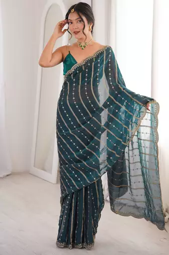 Teal color stylish bollywood looks fendy satin fabric saree