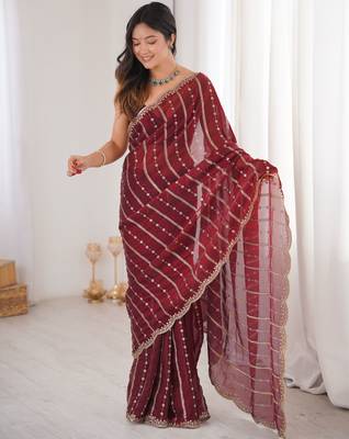 Maroon color stylish bollywood looks fendy satin fabric saree 1