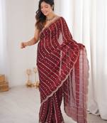 Maroon color stylish bollywood looks fendy satin fabric saree