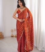 Orange color stylish bollywood looks fendy satin fabric saree