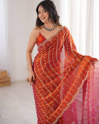 Orange color stylish bollywood looks fendy satin fabric saree 3
