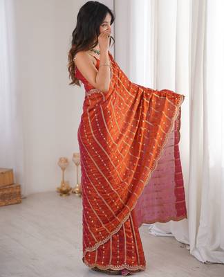 Orange color stylish bollywood looks fendy satin fabric saree 4