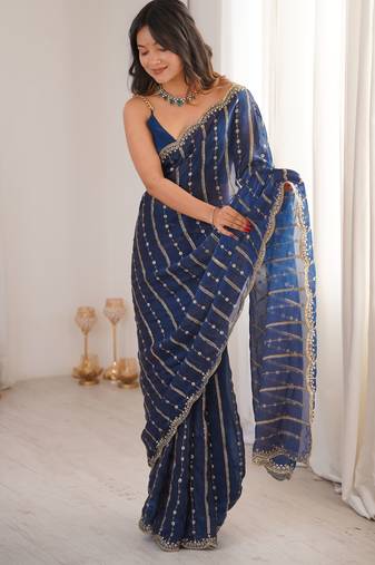 Petrol color stylish bollywood looks fendy satin fabric saree