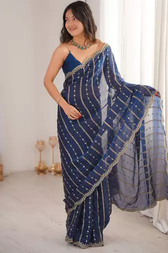 Petrol color stylish bollywood looks fendy satin fabric saree