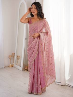 Pink color stylish bollywood looks fendy satin fabric saree 1