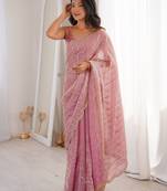 Pink color stylish bollywood looks fendy satin fabric saree