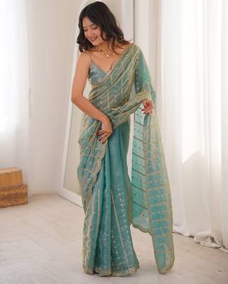 Sky blue color stylish bollywood looks fendy satin fabric saree 1