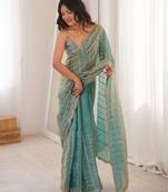 Sky blue color stylish bollywood looks fendy satin fabric saree