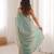 Sky blue color stylish bollywood looks fendy satin fabric saree
