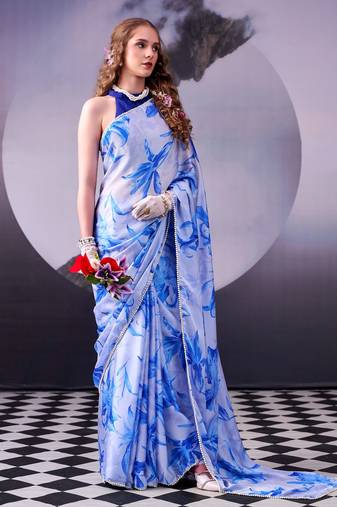 Beautiful and rich looks blue color floral printed satin silk saree