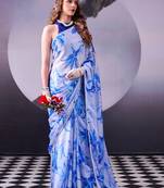 Beautiful and rich looks blue color floral printed satin silk saree