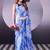 Beautiful and rich looks blue color floral printed satin silk saree