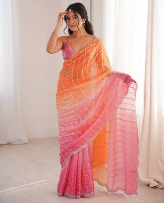 Orange color fendy satin fabric beautiful fancy embroidered saree 2