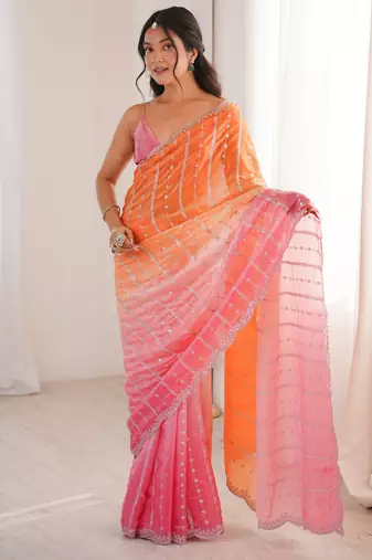 Orange color fendy satin fabric beautiful fancy embroidered saree