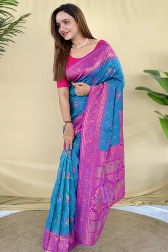 Blue zari weaving banarasi silk blend saree with imaginative blouse piece