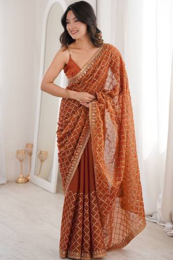 Orange color moss two tone fabric heavy designer partywear saree