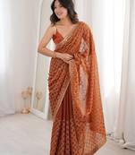 Orange color moss two tone fabric heavy designer partywear saree