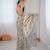 Chiku color fendy satin beautiful rich feel ceremonial looks saree