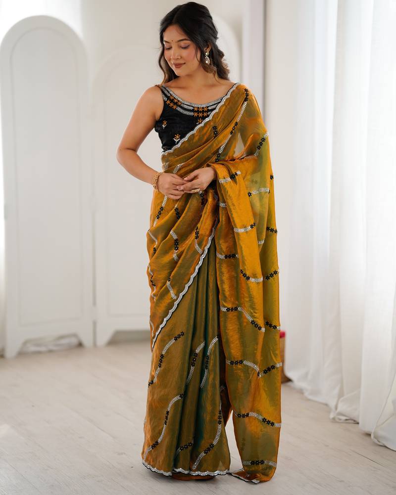 Gold color fendy satin beautiful rich feel ceremonial looks saree