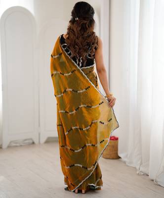 Gold color fendy satin beautiful rich feel ceremonial looks saree 2