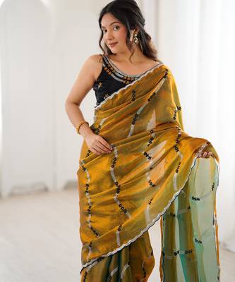 Gold color fendy satin beautiful rich feel ceremonial looks saree 3